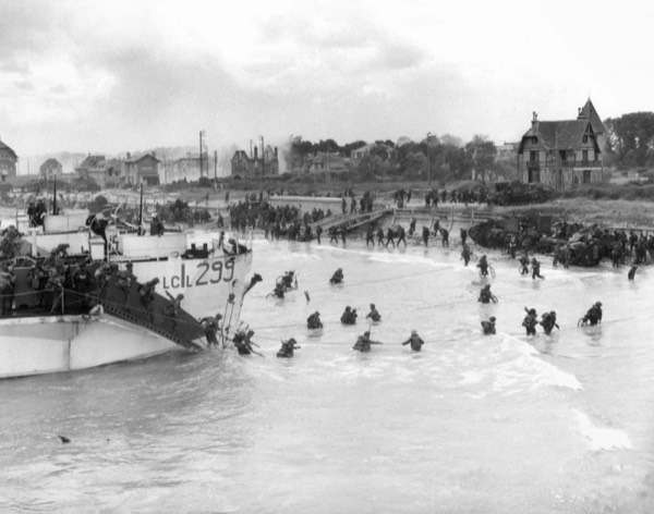 Archival photograph of Canadian troops landing at Juno Beach on D-Day