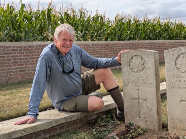 A guest at the grave of a soldier of the 49th Battalion, Canadian Infantry
